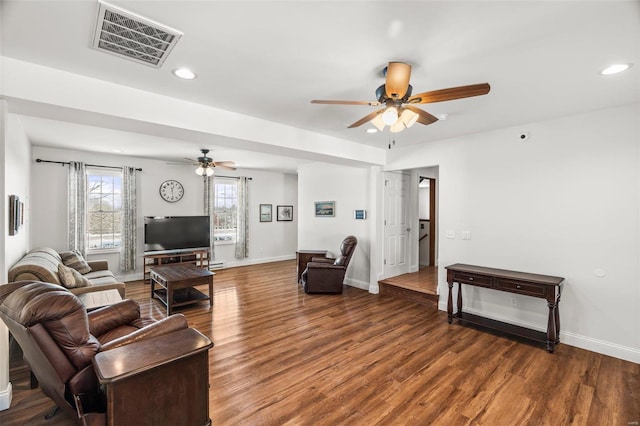 living area featuring recessed lighting, wood finished floors, a ceiling fan, visible vents, and baseboards