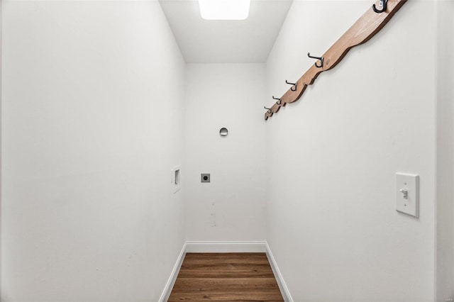 laundry room featuring washer hookup, electric dryer hookup, wood finished floors, laundry area, and baseboards