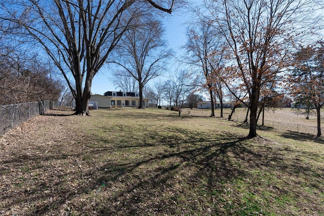 view of yard with fence