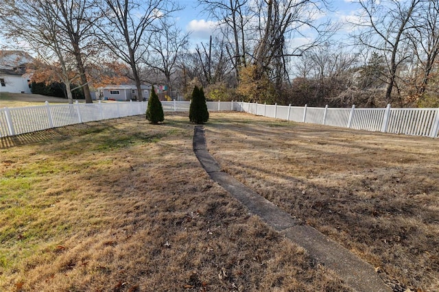 view of yard featuring fence