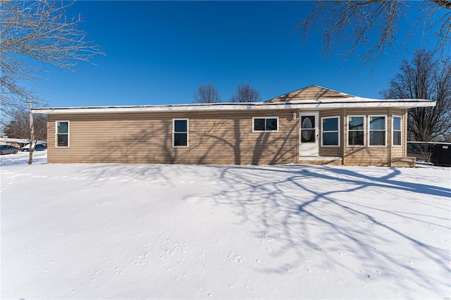 view of snow covered property