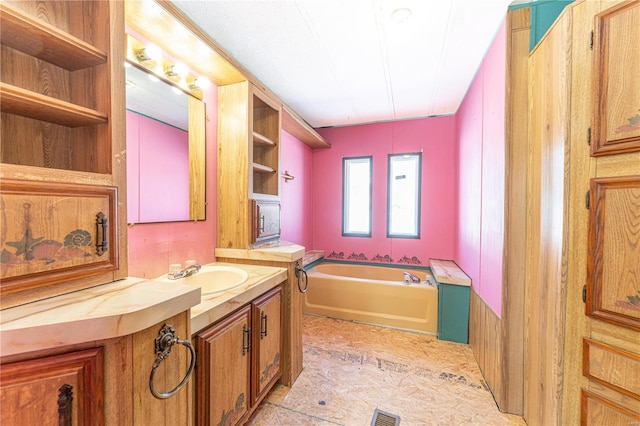 bathroom featuring a bathtub and vanity