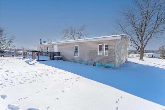 view of snow covered house