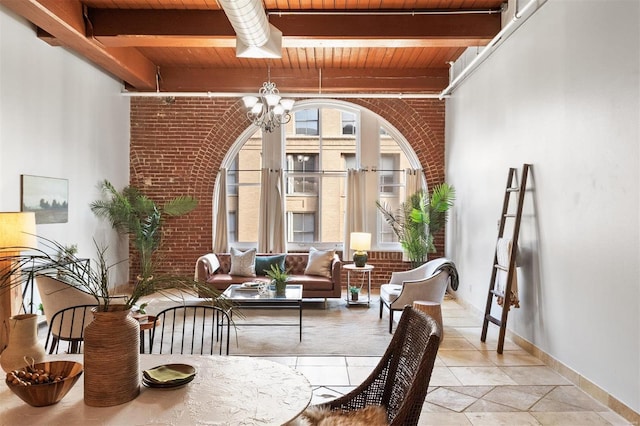 interior space with beamed ceiling, an inviting chandelier, and wood ceiling