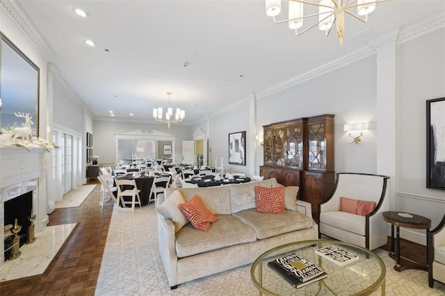 living room featuring a notable chandelier, parquet floors, ornamental molding, and a premium fireplace