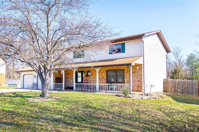 traditional-style house with brick siding, a front lawn, fence, covered porch, and a garage