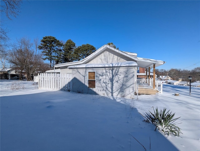 view of snow covered property