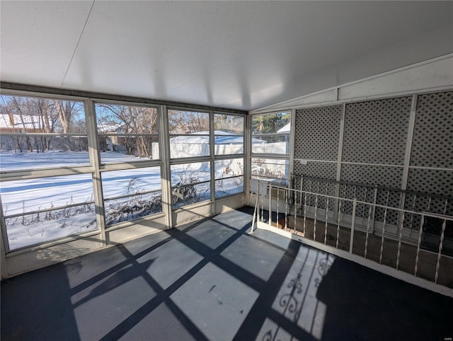 unfurnished sunroom featuring a wealth of natural light