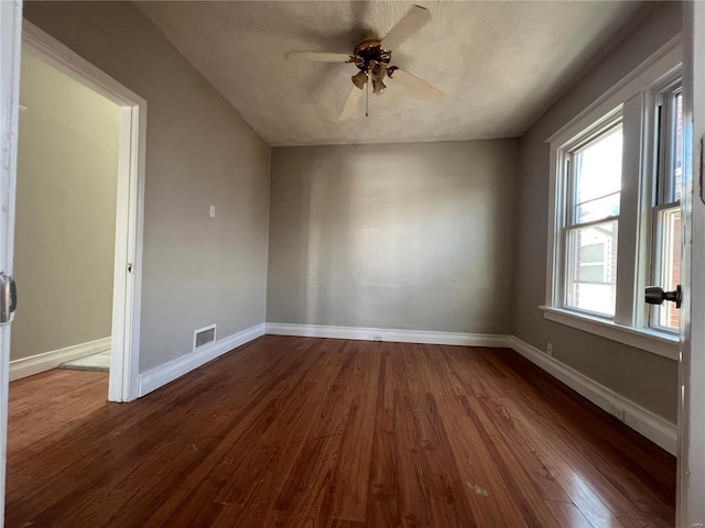 unfurnished room featuring hardwood / wood-style floors and ceiling fan