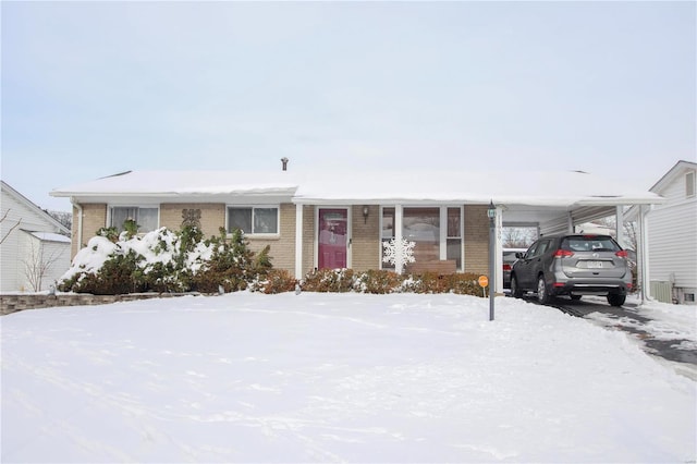 view of front of property with a carport