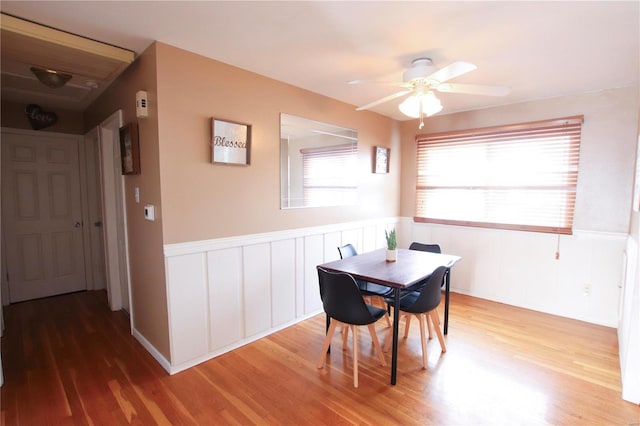 dining room featuring ceiling fan and hardwood / wood-style floors