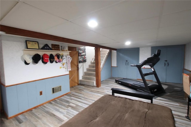 workout area featuring wood-type flooring