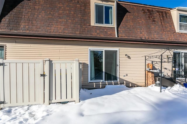 view of snow covered house