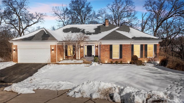 view of front of home with a garage