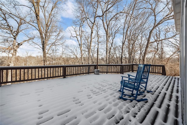 view of snow covered deck