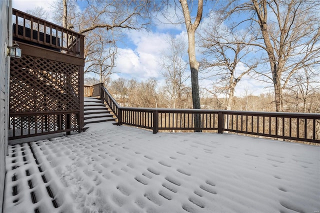 view of snow covered deck