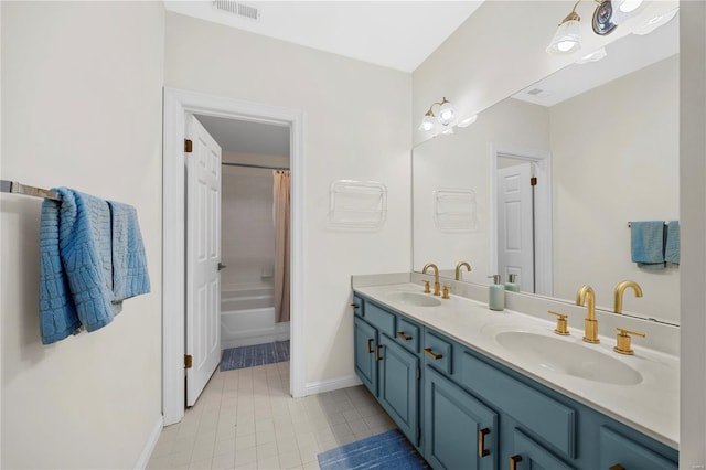 bathroom featuring shower / tub combo with curtain and vanity