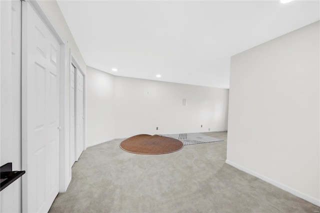 basement with light carpet