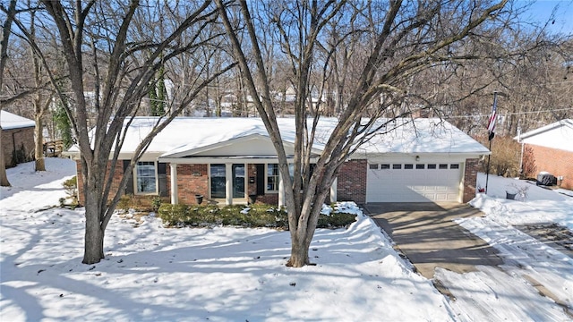 single story home with a garage