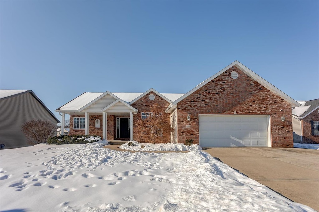 view of front of property featuring a garage