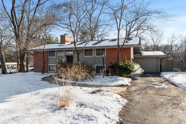 single story home featuring a garage