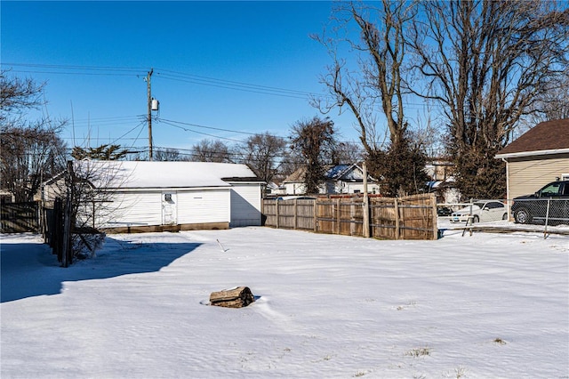 view of yard covered in snow