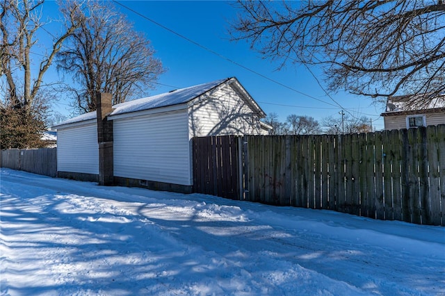 view of snow covered garage