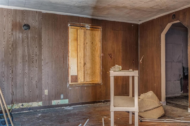 misc room featuring wooden walls