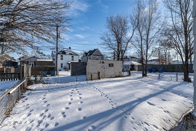 view of yard covered in snow