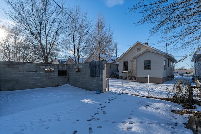 view of snow covered house