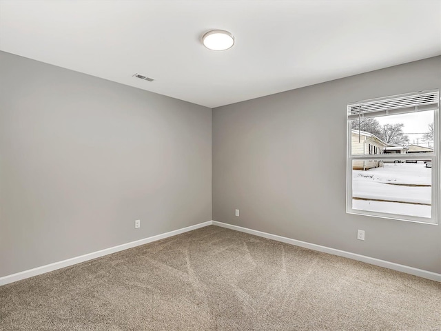 view of carpeted spare room