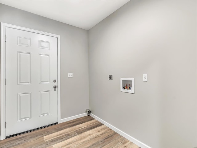 washroom with electric dryer hookup, light wood-type flooring, and hookup for a washing machine