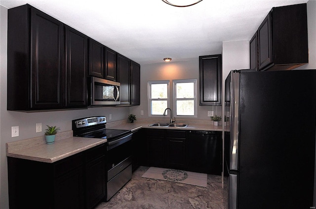 kitchen featuring stainless steel appliances and sink