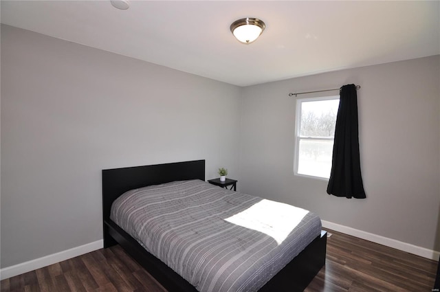 bedroom featuring dark hardwood / wood-style floors