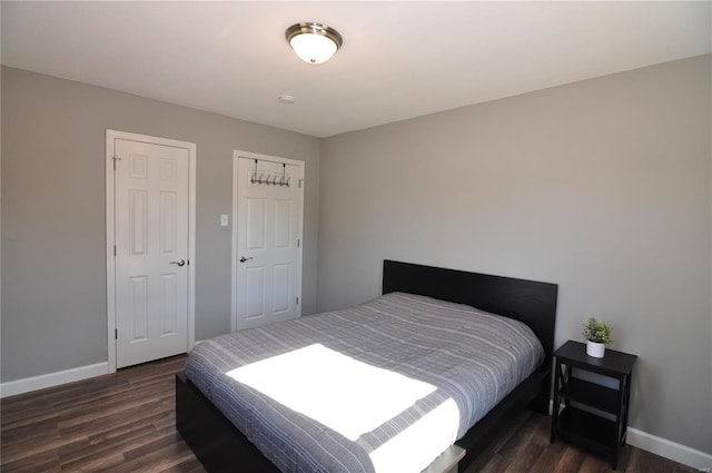 bedroom featuring dark hardwood / wood-style floors