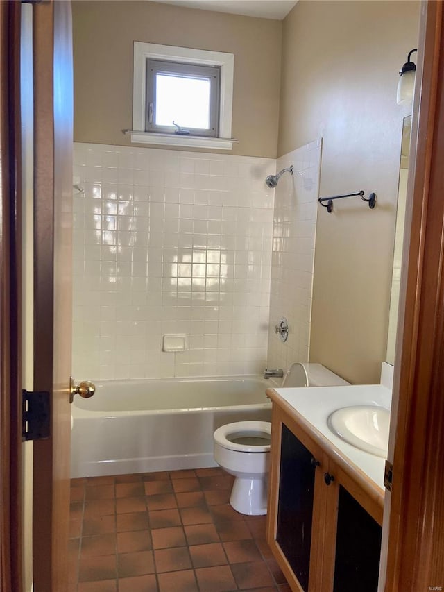 full bathroom featuring tile patterned flooring, vanity, toilet, and bathing tub / shower combination