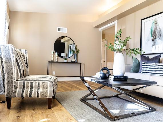 living area featuring hardwood / wood-style flooring