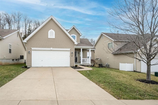 view of front facade featuring a garage, a front yard, covered porch, and cooling unit