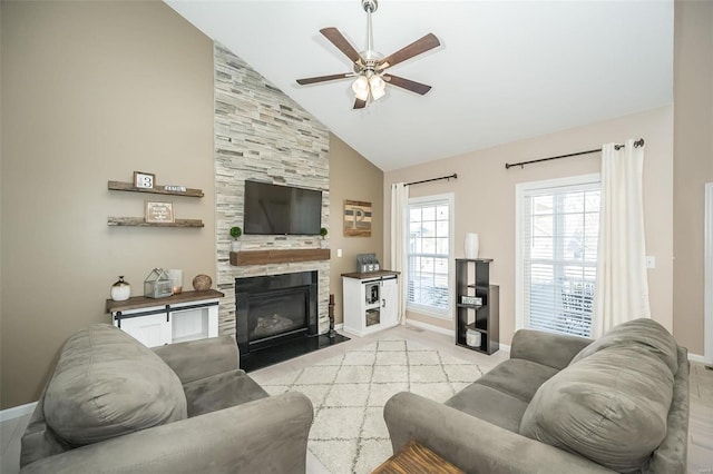 living room featuring a fireplace, high vaulted ceiling, and ceiling fan