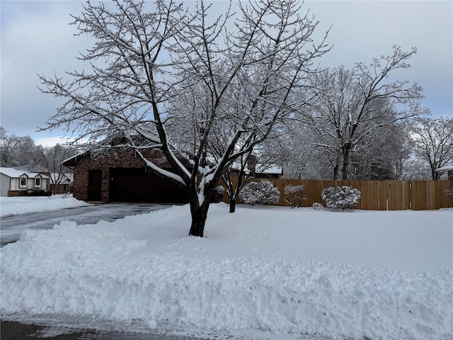 view of yard covered in snow