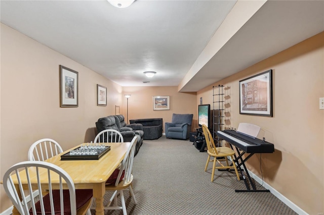 view of carpeted dining space