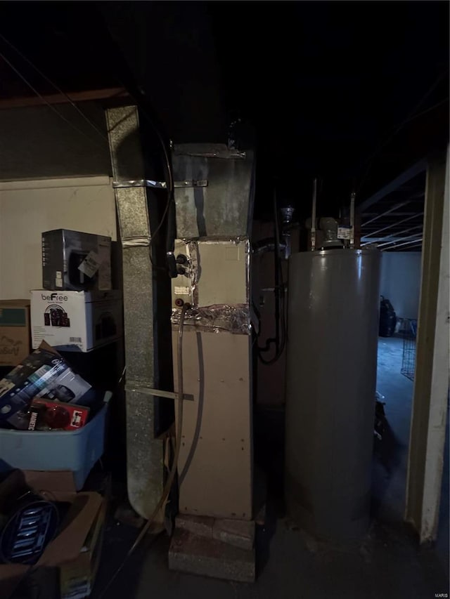 utility room with water heater