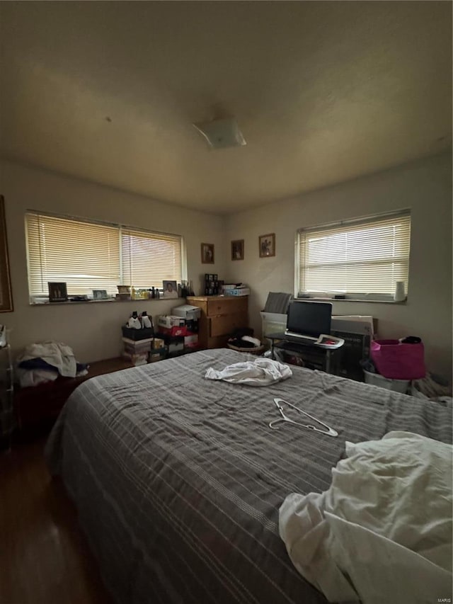 bedroom featuring hardwood / wood-style flooring