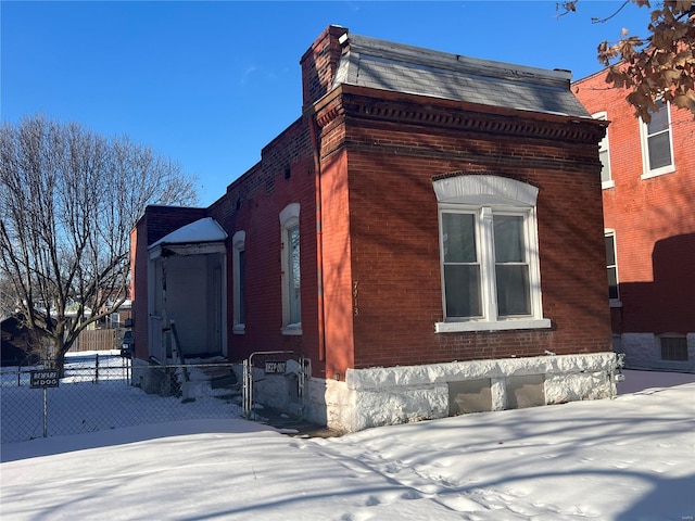 view of snow covered exterior