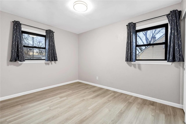 empty room featuring light wood-type flooring