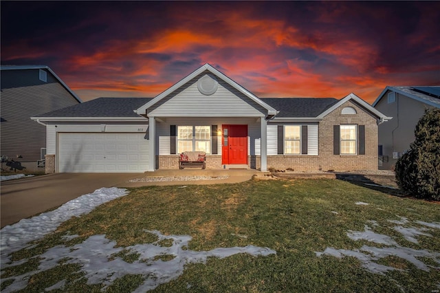 ranch-style house with a lawn, a porch, and a garage