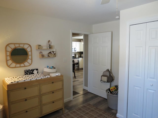 bathroom with wood-type flooring and ceiling fan