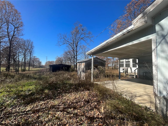 view of yard with a carport