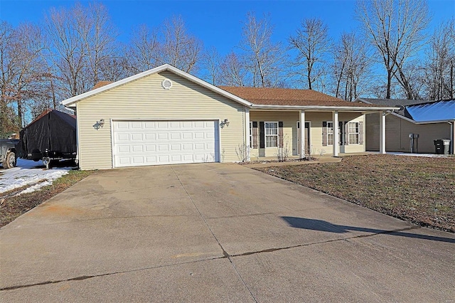 single story home with a garage and a porch