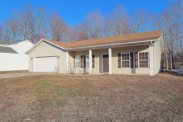 ranch-style house featuring a garage, a front lawn, and covered porch